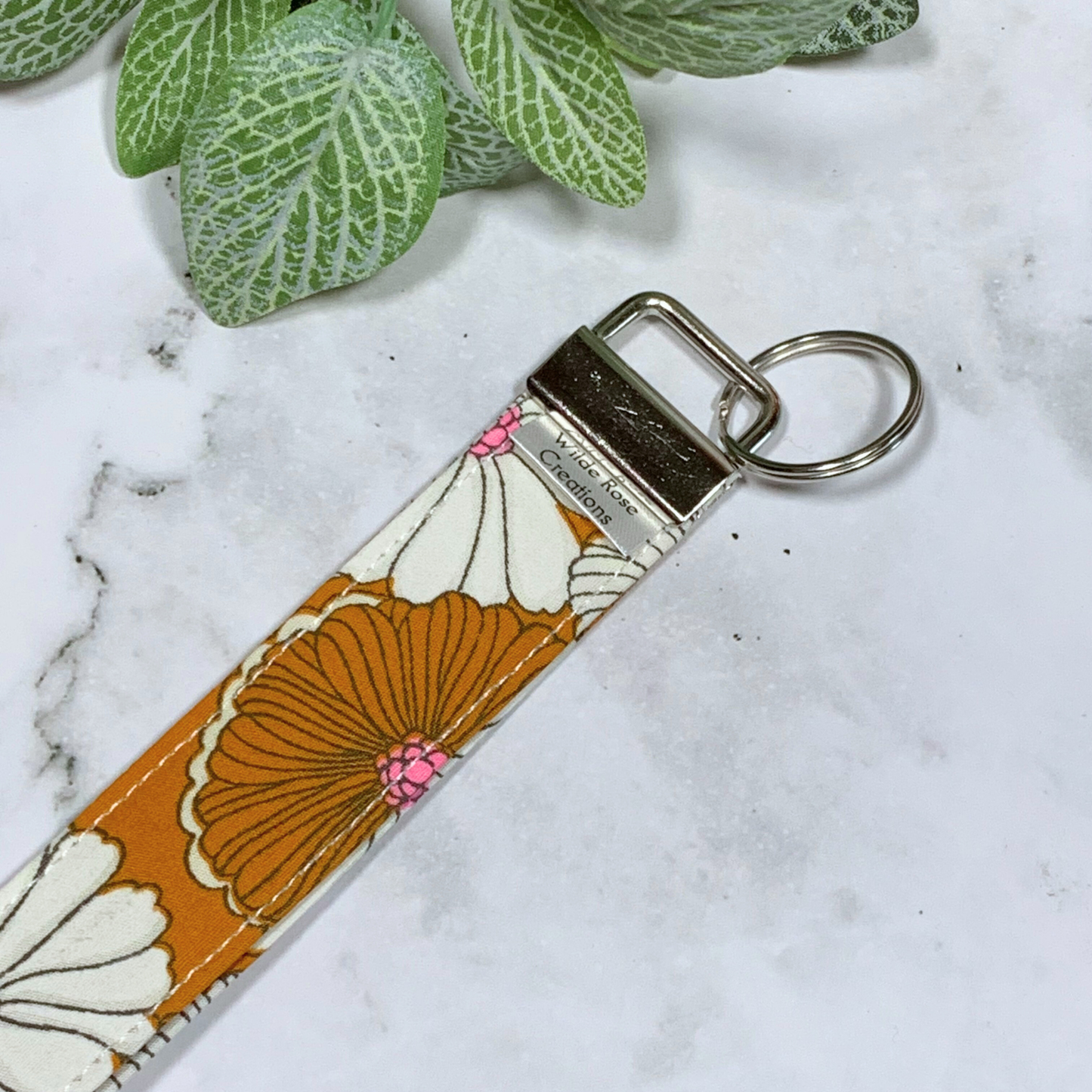 Mustard Orange Floral Wristlet