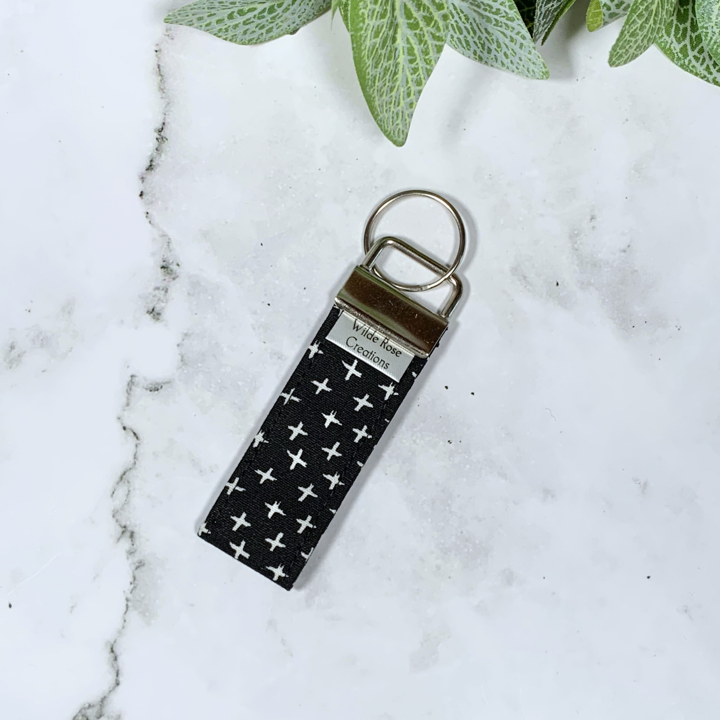White Crosses on Black Fabric Keyring
